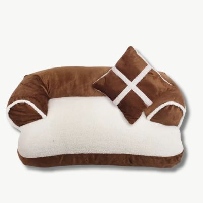 canape-chien-brun-avec-coussin